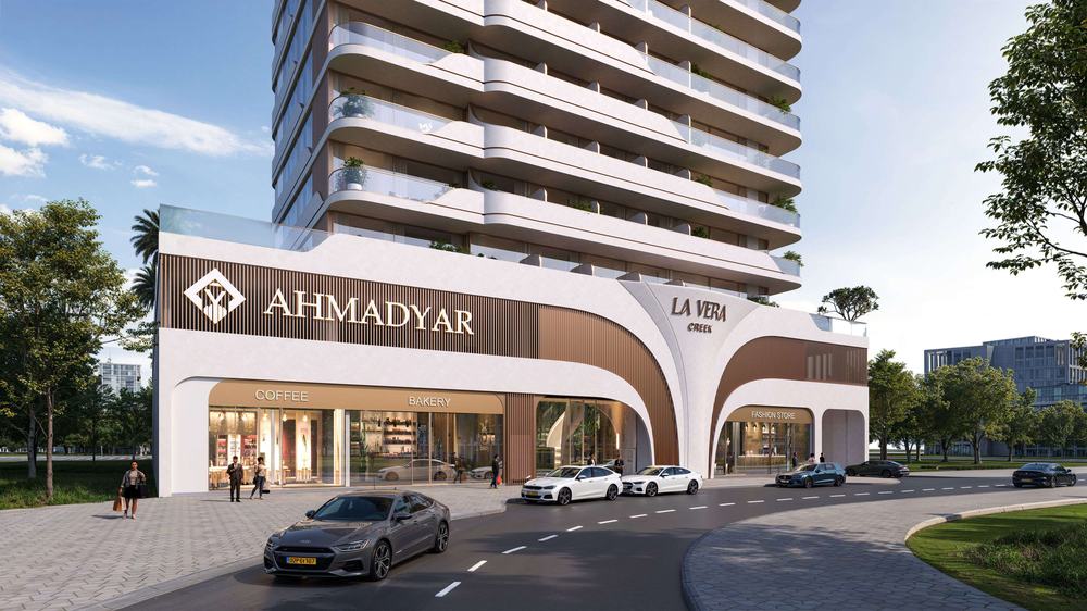 Street-level arcade with retail, café and bakery at La Vera Creek