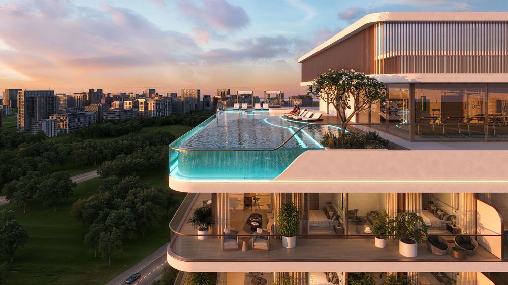 Rooftop infinity pool at golden hour facing west